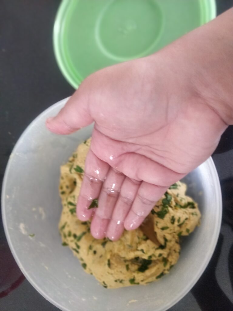 kneading pratha dough
