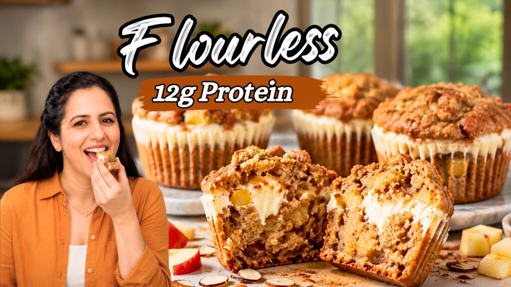 High protein apple muffins split open to show a cream cheese filling and diced apple