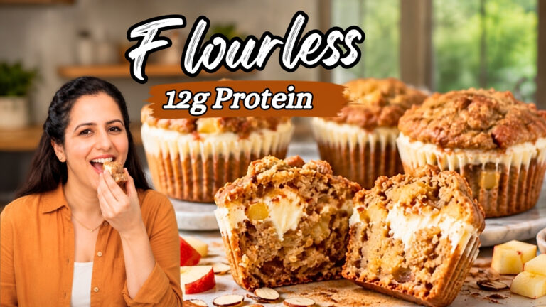 High protein apple muffins split open to show a cream cheese filling and diced apple