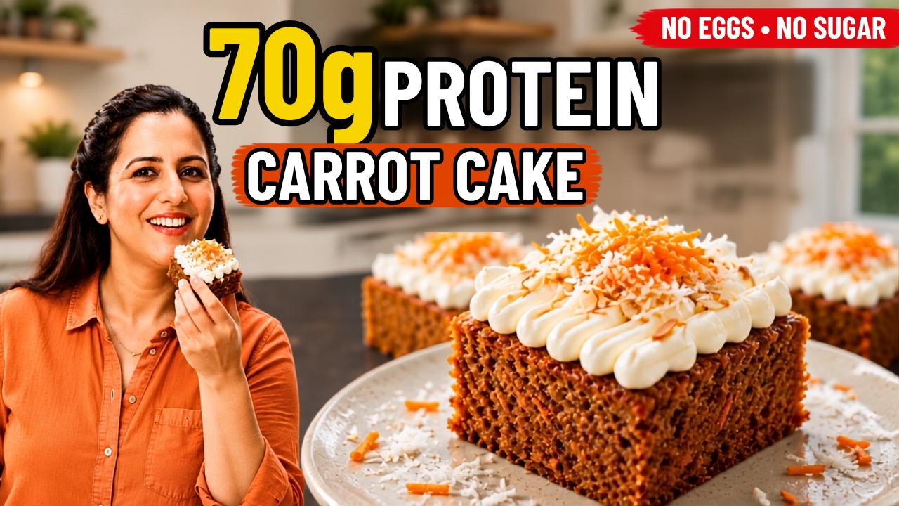 Slice of high protein carrot cake with Greek yogurt frosting and walnuts on a plate