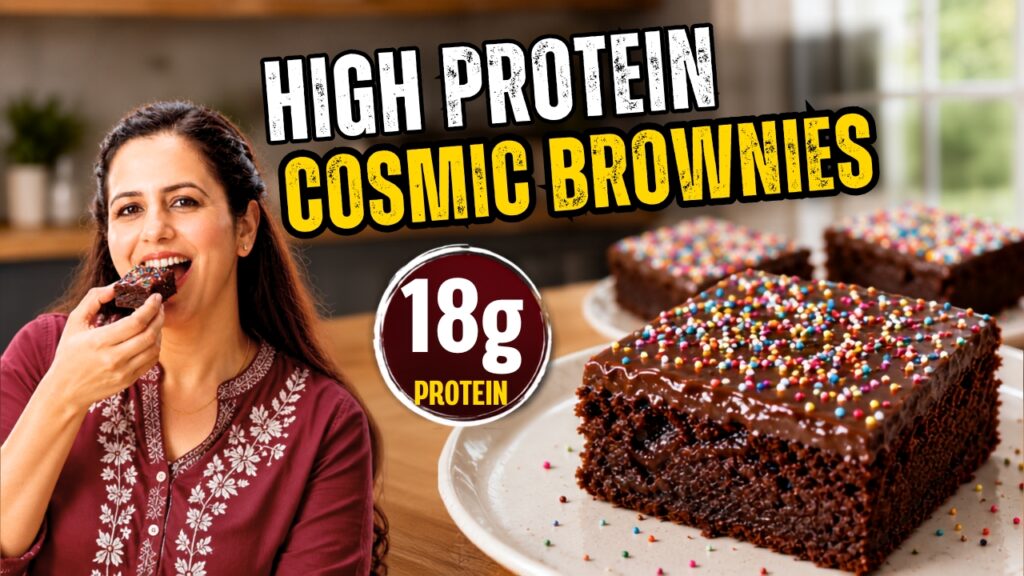 Fudgy eggless cottage cheese cosmic brownies topped with chocolate ganache and rainbow sprinkles on a white plate