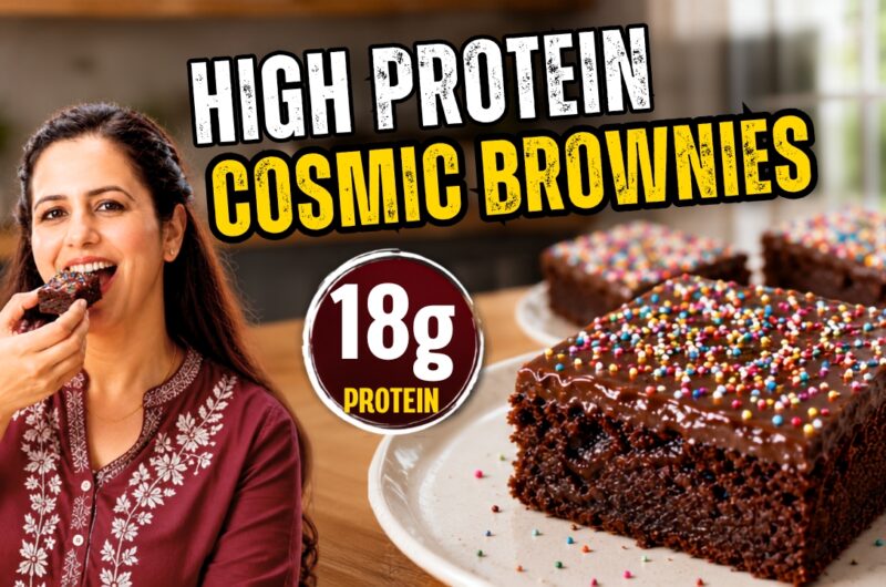 Fudgy eggless cottage cheese cosmic brownies topped with chocolate ganache and rainbow sprinkles on a white plate