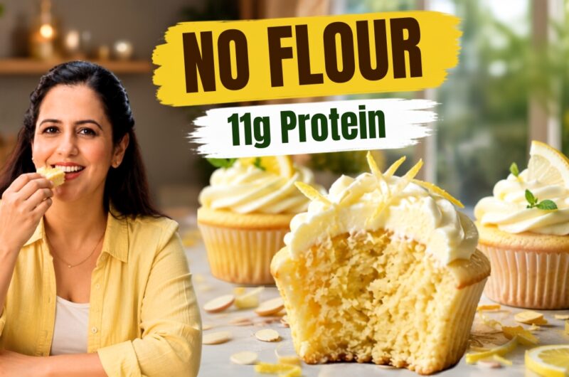 High protein lemon muffins on a wire rack, one split open to show a soft crumb