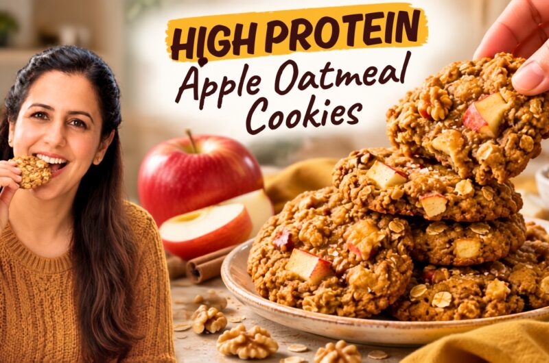 Soft high-protein apple oatmeal cookies with visible apple, raisins, and walnuts on parchment