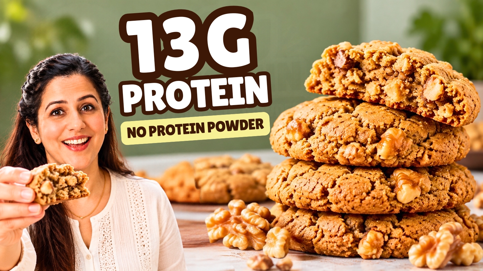 Stack of three healthy walnut cookies with the top one broken open to show a soft center and walnut pieces