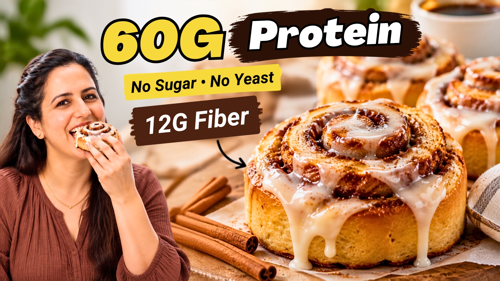 Pumpkin cinnamon rolls with cream cheese glaze dripping down the sides, cinnamon sticks beside them