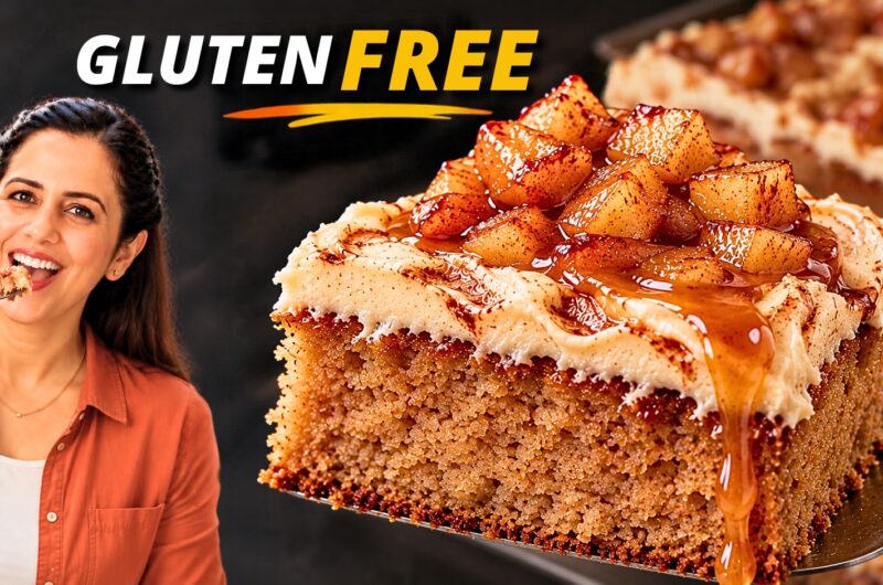 Square of gluten-free applesauce cake with Greek yogurt frosting, caramelized apple cubes and caramel drizzle on a cake server
