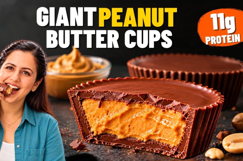 Giant healthy peanut butter cup cut in half showing a thick peanut butter filling inside a dark chocolate shell