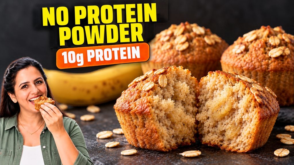 High protein banana muffins torn open to show the soft crumb