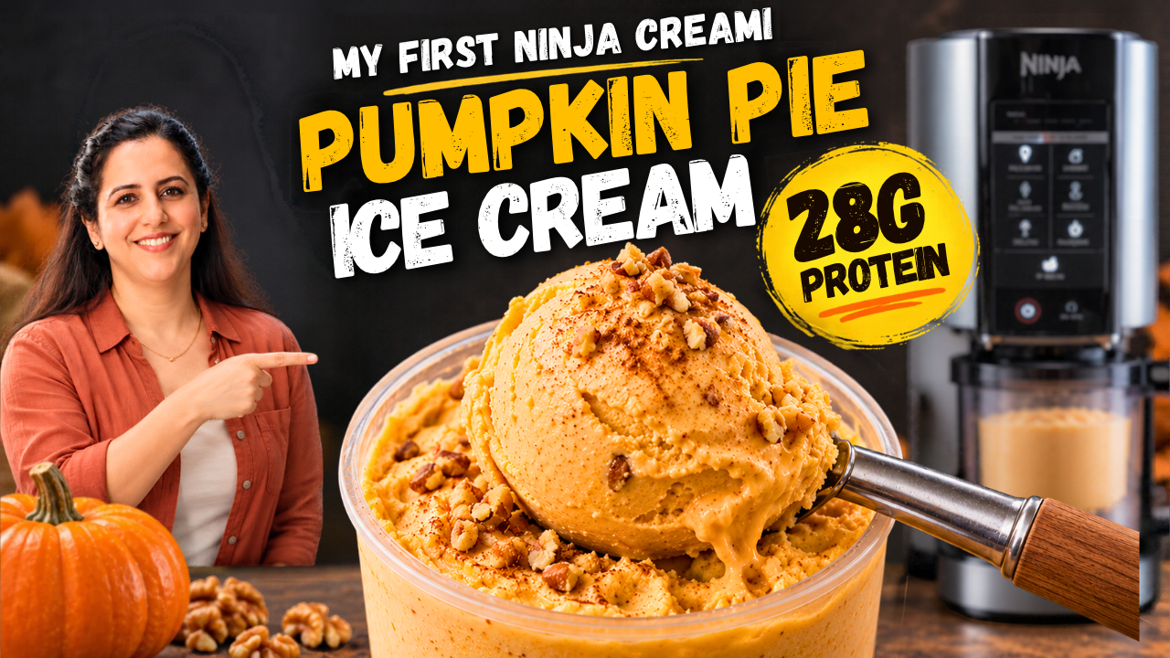 Scoop of pumpkin pie protein ice cream lifted from a Ninja Creami pint, dusted with pumpkin pie spice